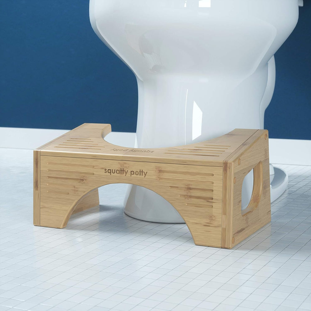 Squatty Potty en un baño decorado mostrando integración estética y funcionalidad
