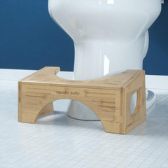 Squatty Potty en un baño decorado mostrando integración estética y funcionalidad