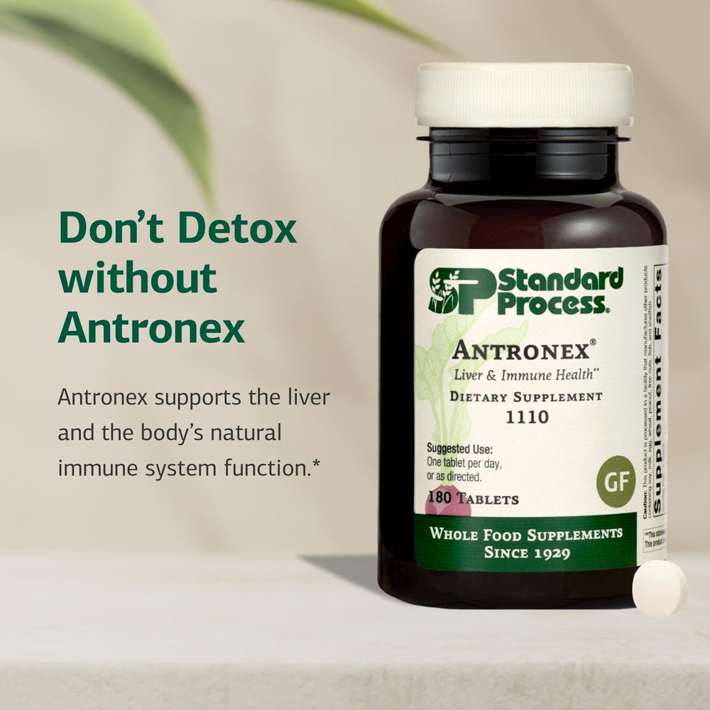 Standard Process Antronex envase abierto con tabletas accesibles para uso fácil