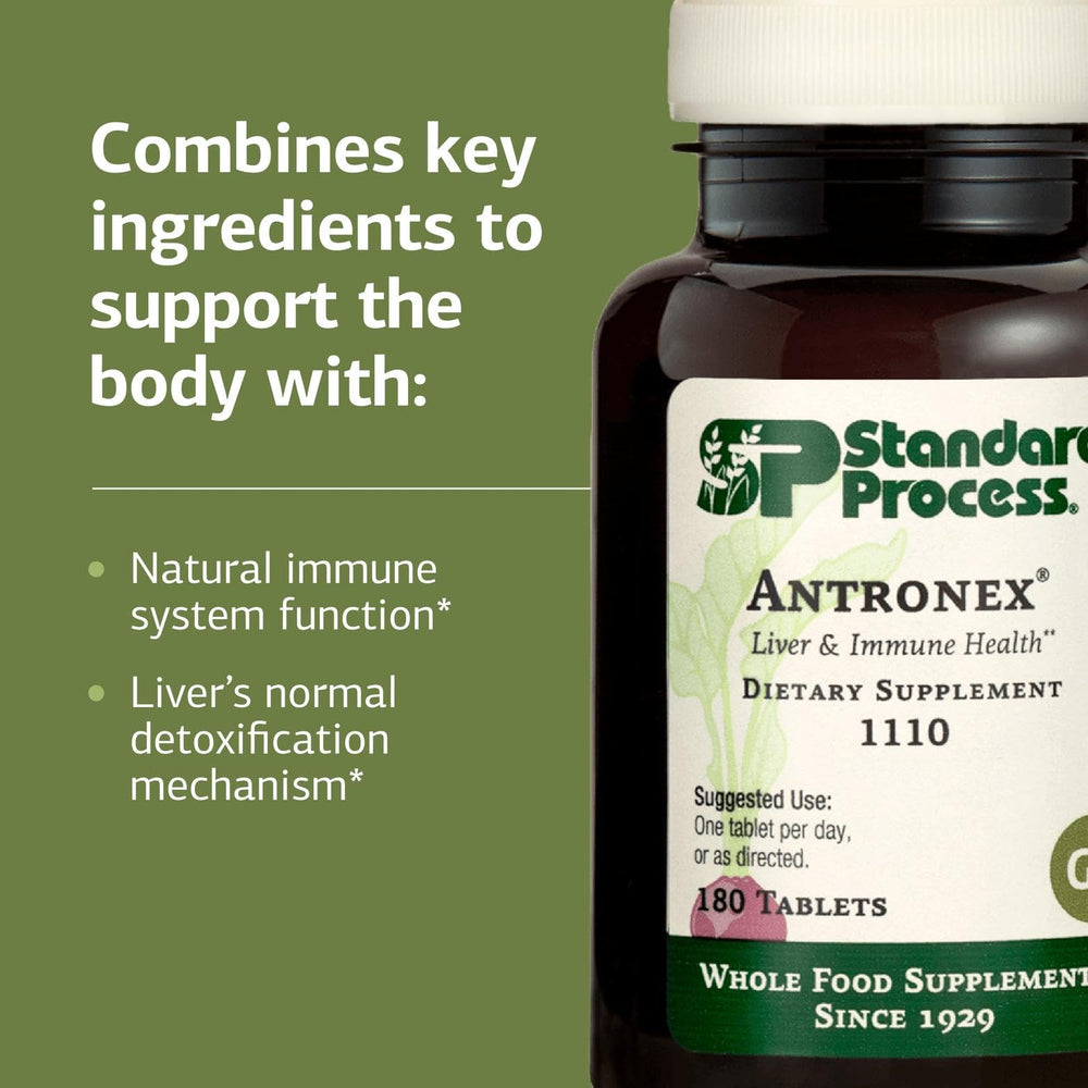 Standard Process Antronex en mano mostrando la dosis diaria recomendada