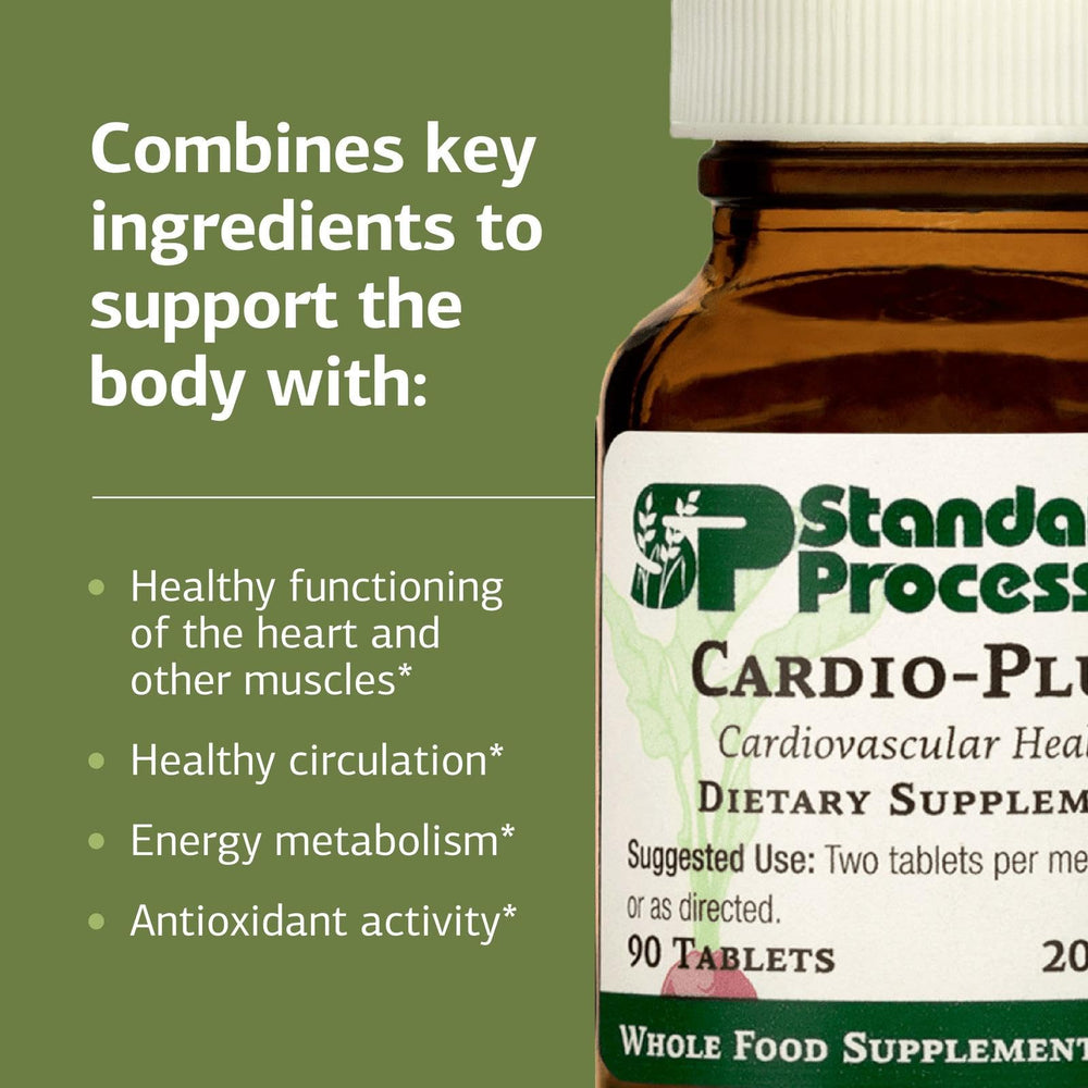 Standard Process Cardio-Plus tabletas en mano para comparar escala