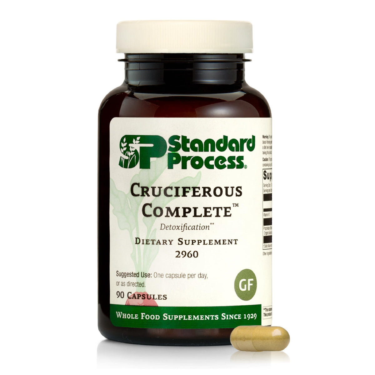 Standard Process envase frontal mostrando Cruciferous Complete y beneficios claros