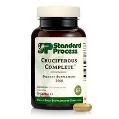 Standard Process envase frontal mostrando Cruciferous Complete y beneficios claros