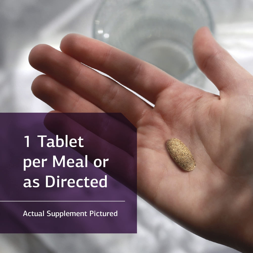 Standard Process Drenamin tabletas en mano para comparar escala y dosificación