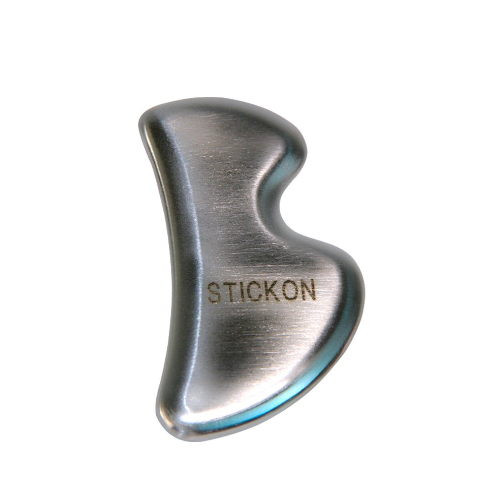 STICKON vista frontal del gua sha en empaque mostrando acabado y forma B, durabilidad