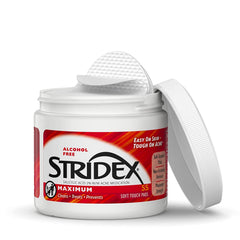 Stridex en escenario de baño ordenado, integración en rutina diaria