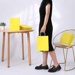 SUNCOLOR ambientación de mesa con varias bolsas evidenciando efecto alegre en fiestas