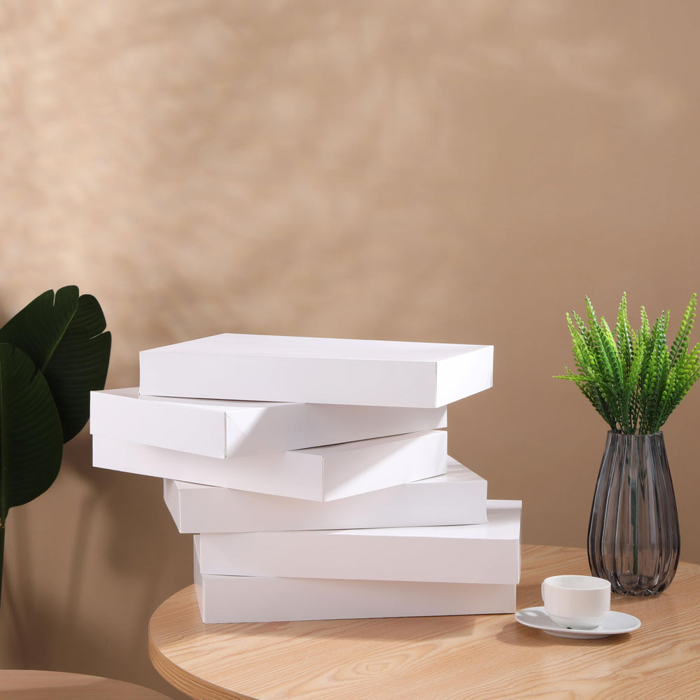 SUNCOLOR caja abierta con camiseta doblada lista para regalo