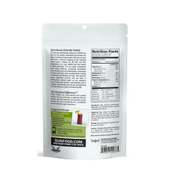 Sunfood Superfoods tabletas en primer plano, textura compacta y aspecto natural