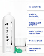 Supersmile botella en mano para comparar tamaño, indica rendimiento de 90 usos