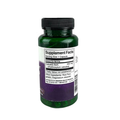 Swanson Catuaba, cápsulas en mano para tomar con agua y bienestar diario.