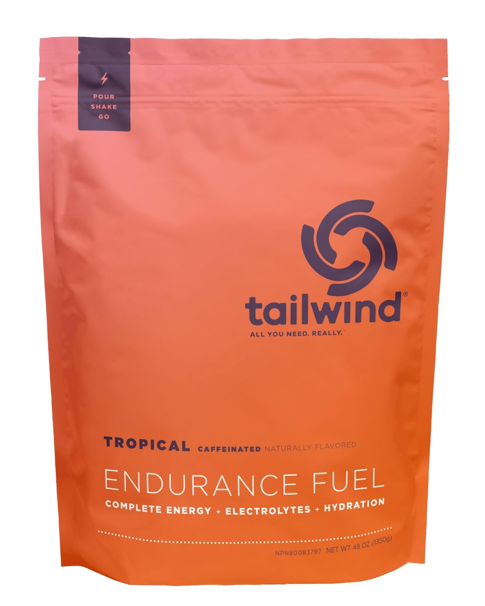 Tailwind Nutrition mezcla Tropical Buzz disolviéndose clara en agua hidratación rápida