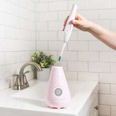 Tao Clean comparación de tamaño con cepillo manual, compacto y práctico
