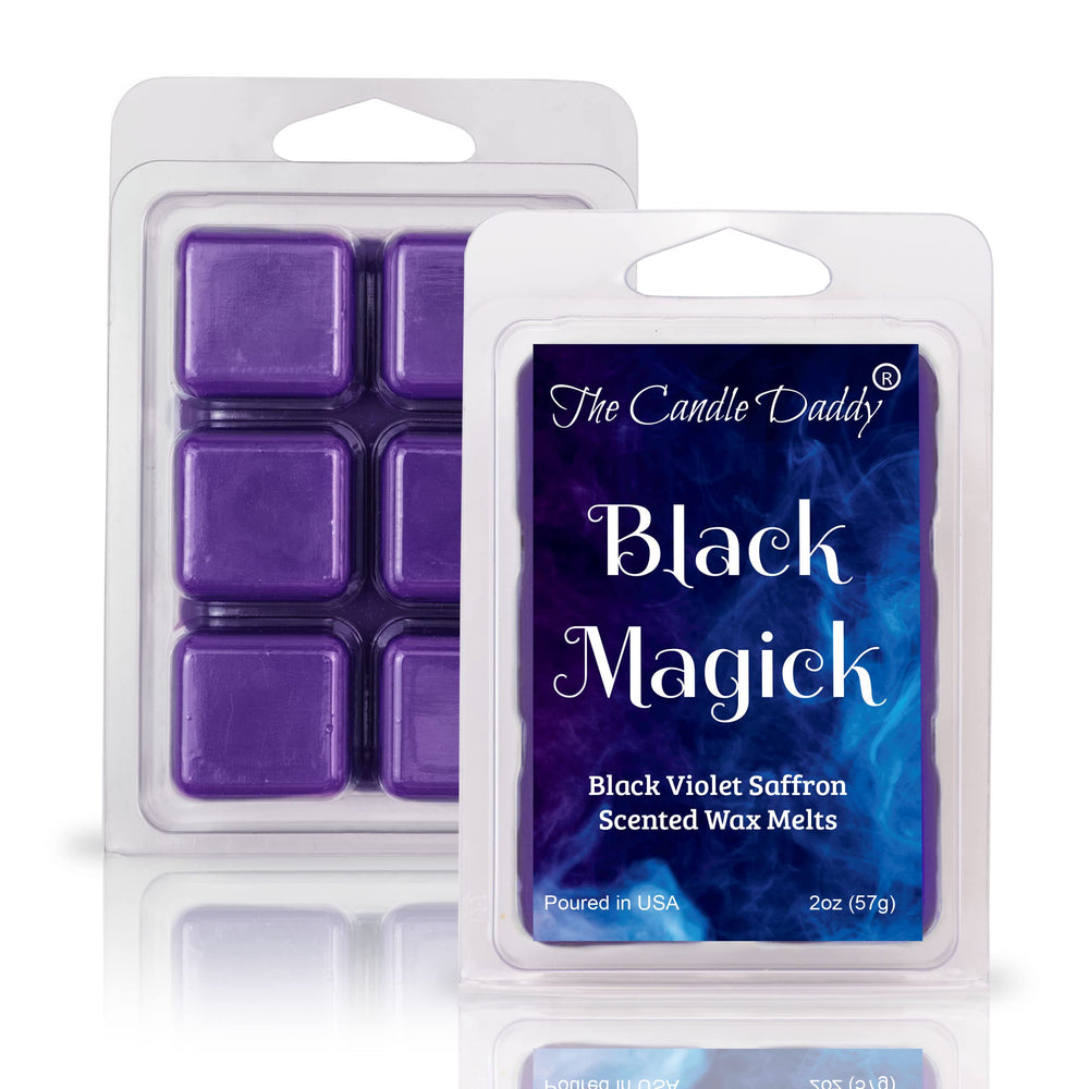 The Candle Daddy wax melt en quemador, perfuma sin vela abierta