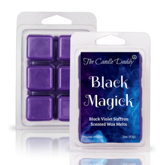 The Candle Daddy wax melt en quemador, perfuma sin vela abierta