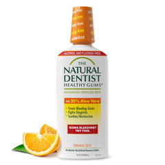 The Natural Dentist botella frontal naranja mostrando volumen y etiqueta clara