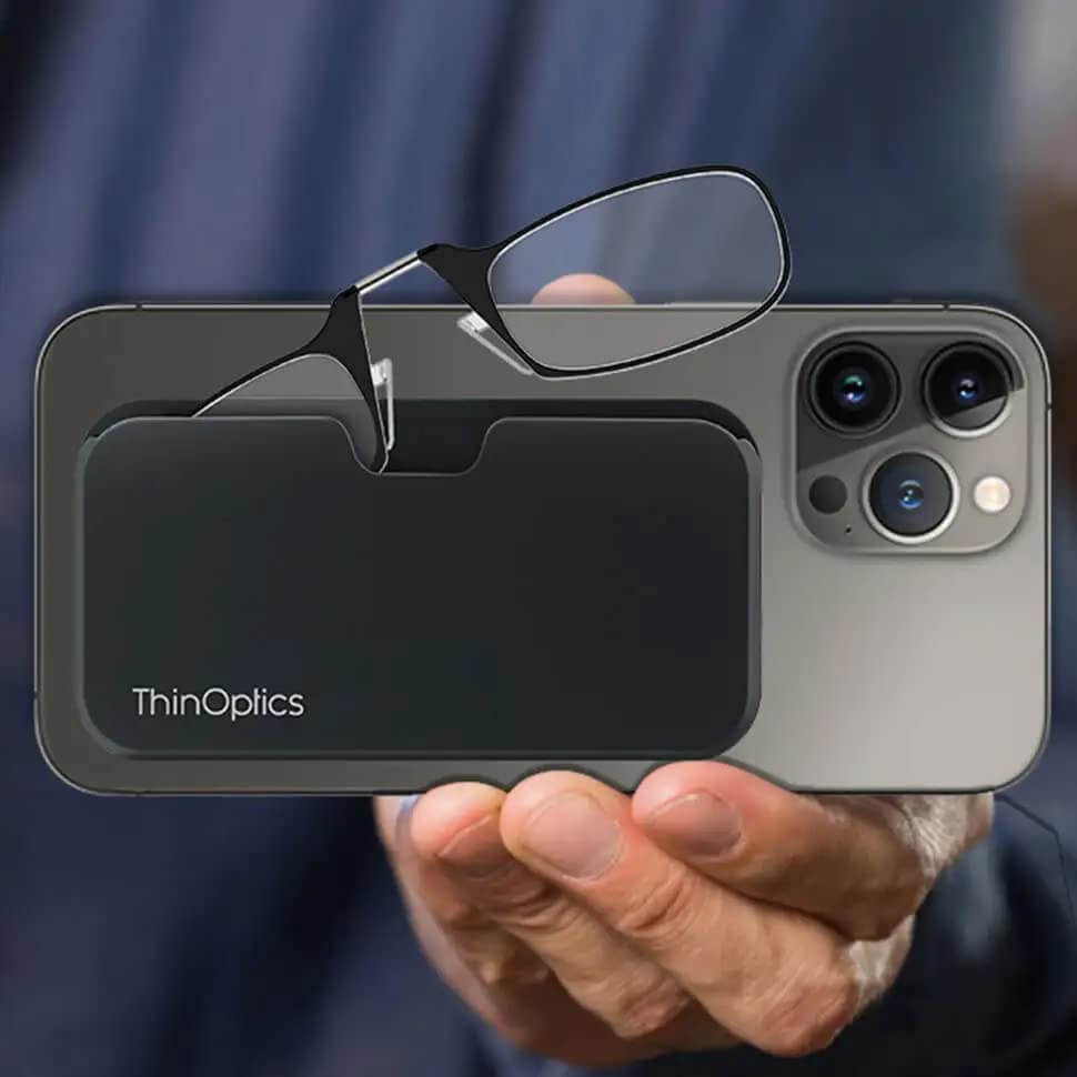 ThinOptics funda Universal Pod adherida al móvil, fácil transporte