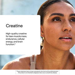 Scooped THORNE unflavored creatine powder on spoon