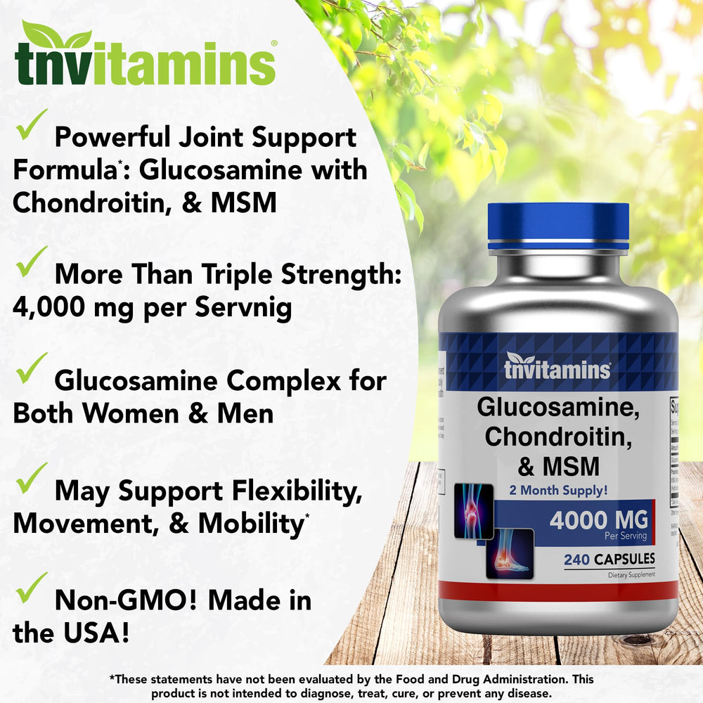 tnvitamins cápsula en mano para comparar escala y facilidad de tragar