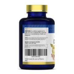 tnvitamins cápsula junto a un vaso de agua para consumo diario