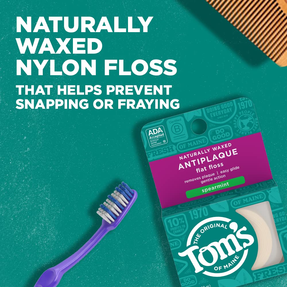 Tom's of Maine primer plano del hilo encerado que facilita deslizamiento suave