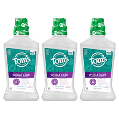 Tom's of Maine botellas mostrando símbolo de reciclaje y reducción de residuos