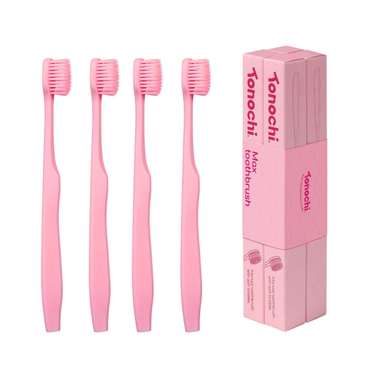 Tonochi paquete de cuatro cepillos rosa mostrando embalaje frontal y ordenados, higiene práctica
