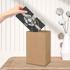 Toovip bolsa en uso con compras pequeñas facilitando entrega y orden