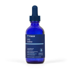 Trace Minerals frasco frente mostrando etiqueta y beneficio de dosificación precisa