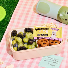 TRUBAR familia en merienda usando barras y disfrutando snack saludable