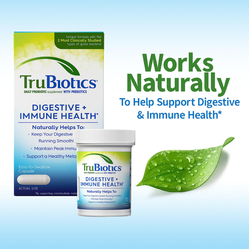 TruBiotics cápsulas junto a regla para ver tamaño y dosis práctica
