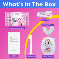 Trueocity cepillo en mano de niño mostrando agarre ergonómico y control fácil