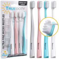 Trueocity vista frontal del empaque que muestra pack de cuatro cepillos, práctico para viaje