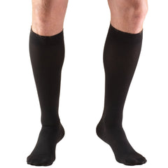 Truform empaque frontal mostrando medias negras y beneficios de soporte