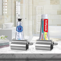 UDQYQ en uso apretando pasta dental para extraer el último contenido