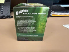 Underberg etiqueta y envoltura de paja, preserva frescura y tradición