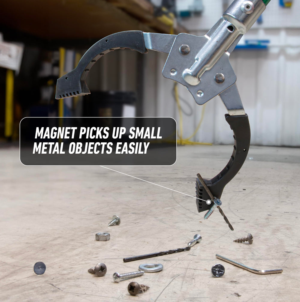 UNGER recogedor con imán integrado captando un tornillo metálico, recoge piezas pequeñas
