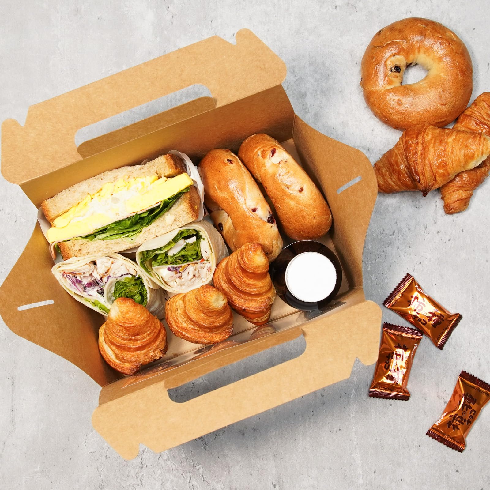 UnicoPak caja con comida como sándwich, protección y presentación