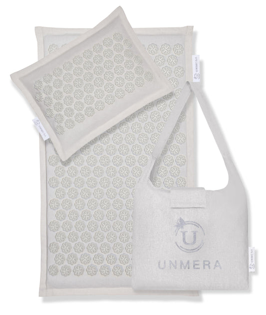 UNMERA esterilla vista frontal mostrando cobertura y diseño, ayuda a relajar espalda
