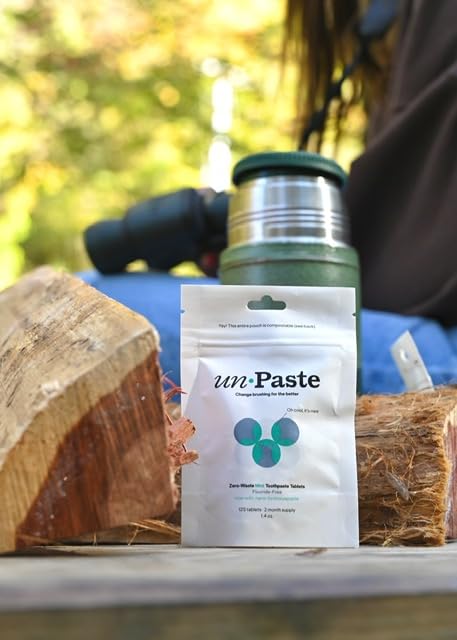Unpaste envase resellable abierto demostrando cierre reutilizable