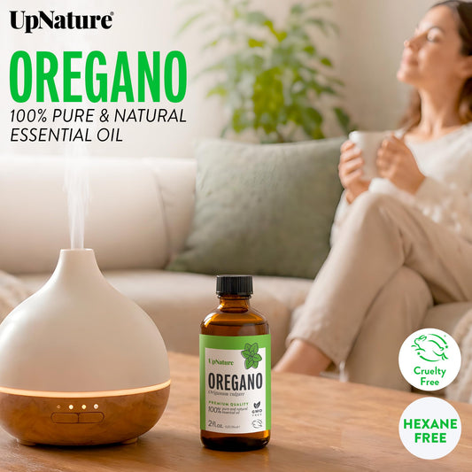 UpNature gota de aceite de orégano sobre piel diluida, muestra textura y pureza