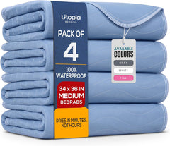 Utopia Bedding vista frontal del empaque mostrando cuatro almohadillas y beneficio de protección