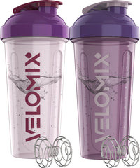 VELOMIX frontal pack morado mostrando dos botellas, práctico y moderno