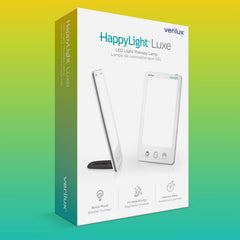 Comparación de tamaño Verilux con libro mostrando portabilidad