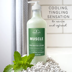Village Naturals Therapy producto en ambiente relajante junto a toalla y sales de baño