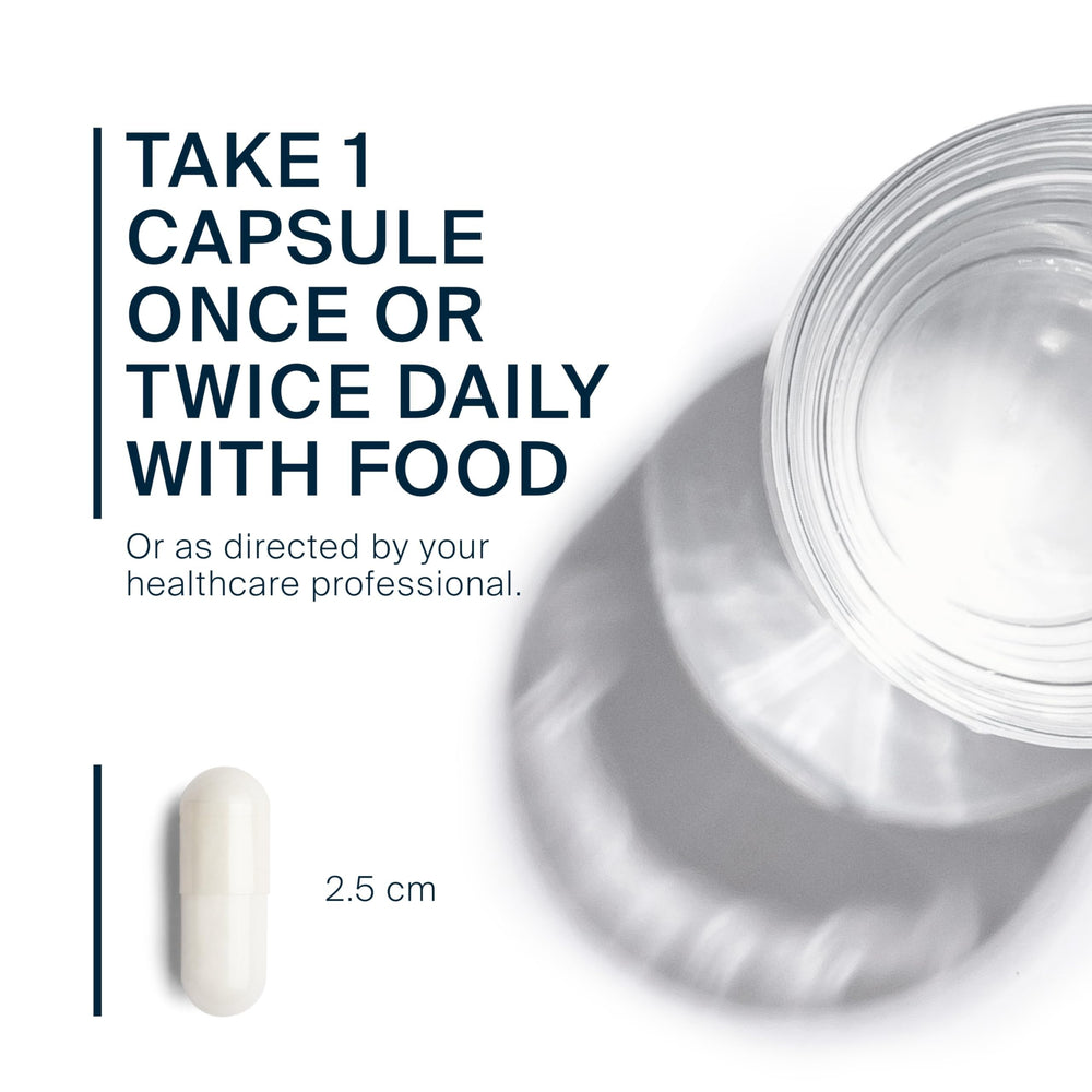 Vital Nutrients cápsulas junto a regla para comparación de tamaño
