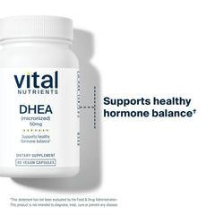 Vital Nutrients cápsula junto a una moneda para escala, muestra tamaño real