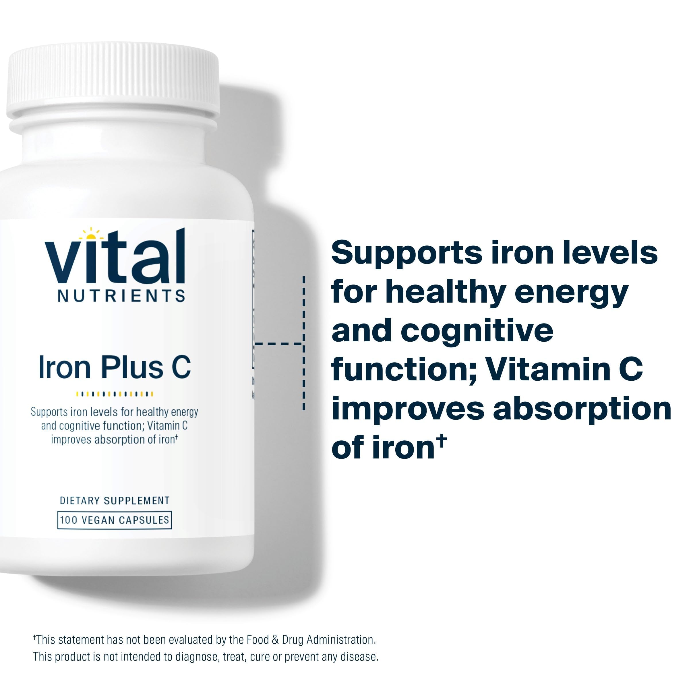 Vital Nutrients frasco sobre mesa con bebida cítrica para absorción
