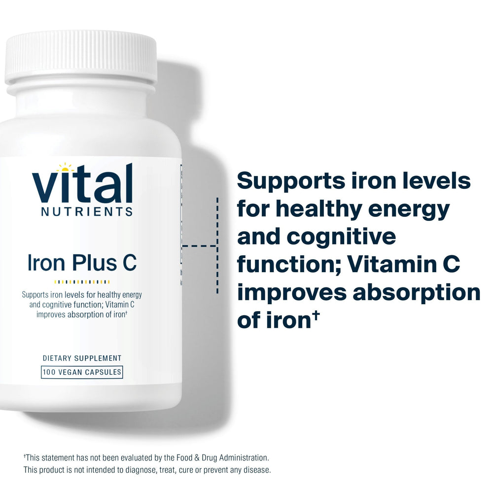 Vital Nutrients frasco sobre mesa con bebida cítrica para absorción