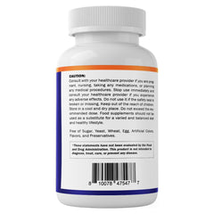 Vitamatic cápsula junto a moneda para comparar tamaño y portabilidad